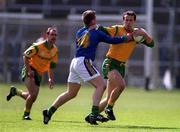 23 April 2000; Anthony Moyles of Meath in action against Dara O'Cinneide of Kerry during the Church & General National Football League Division 1 Semi-Final match between Kerry and Meath at Semple Stadium in Thurles, Tipperary. Photo by Brendan Moran/Sportsfile
