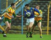 23 April 2000; Aodan MacGearailt of Kerry in action against Cormac Murphy, right, and Richie Kealy of Meath during the Church & General National Football League Division 1 Semi-Final match between Kerry and Meath at Semple Stadium in Thurles, Tipperary. Photo by Brendan Moran/Sportsfile