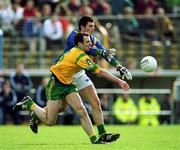 23 April 2000; Aodan MacGearailt of Kerry in action against Hank Traynor of Meath during the Church & General National Football League Division 1 Semi-Final match between Kerry and Meath at Semple Stadium in Thurles, Tipperary. Photo by Brendan Moran/Sportsfile