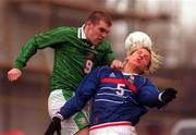 19 April 2000; Ben Burges of Republic of Ireland in action against Philippe Nexes of France during the UEFA European Under-18 Championship Play-Off 2nd Leg match between Republic of Ireland and France at Tolka Park in Dublin. Photo by David Maher/Sportsfile