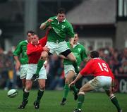 1 April 2000; Brian O'Driscoll of Ireland in action against David Young, left, and Gethin Williams of Wales during the Lloyds TSB 6 Nations match between Ireland and Wales at Lansdowne Road in Dublin. Photo by Damien Eagers/Sportsfile