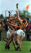 9 April 2000; Canice Brennan, left, and Stephen Grehan of Kilkenny in action against Rory McCarthy of Wexford during the Church & General National Hurling League Division 1B match between Wexford and Kilkenny at O'Kennedy Park in New Ross, Wexford. Photo by Matt Browne/Sportsfile