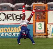 19 April 2000; Djibril Cissé of France celebrates after scoring his side's first goal during the UEFA European Under-18 Championship Play-Off 2nd Leg match between Republic of Ireland and France at Tolka Park in Dublin. Photo by David Maher/Sportsfile