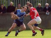 9 April 2000;Ian Robertson of Dublin in action against Donagh Wiseman of Cork during the Church & General National Football League Division 1A match between Dublin and Cork at Parnell Park in Dublin. Photo by Brendan Moran/Sportsfile