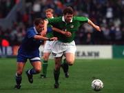 26 April 2000; Kevin Kilbane of Republic of Ireland in action against Angelos Basinas of Greece during the International Friendly match between Republic of Ireland and Greece at Lansdowne Road in Dublin. Photo by Matt Browne/Sportsfile