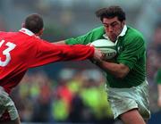 1 April 2000; Kieron Dawson of Ireland is tackled by Alan Bateman of Wales during the Lloyds TSB 6 Nations match between Ireland and Wales at Lansdowne Road in Dublin. Photo by Brendan Moran/Sportsfile