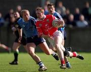9 April 2000; Philip Clifford of Cork in action against Shane Ryan of Dublin during the Church & General National Football League Division 1A match between Dublin and Cork at Parnell Park in Dublin. Photo by Brendan Moran/Sportsfile