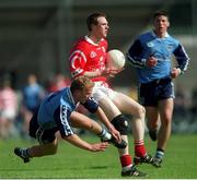 9 April 2000; Philip Clifford of Cork in action against Shane Ryan of Dublin during the Church & General National Football League Division 1A match between Dublin and Cork at Parnell Park in Dublin. Photo by Aoife Rice/Sportsfile