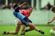9 April 2000; Jason Sherlock of Dublin in action against John Miskella of Cork during the Church & General National Football League Division 1A match between Dublin and Cork at Parnell Park in Dublin. Photo by Brendan Moran/Sportsfile