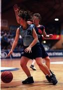 8 February 2000; Jennifer Kelly of Mercy Waterford in action against Mairead Finnegan of Presentation Killarney during the Bank of Ireland Schools Cup Girls' A Final match between Mercy Waterford and Presentation Killarney at National Basketball Arena in Tallaght, Dublin. Photo by Brendan Moran/Sportsfile