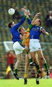 23 April 2000; Dara O'Sé, left, and Donal Daly of Kerry in action against Nigel Crawford of Meath during the Church & General National Football League Division 1 Semi-Final match between Kerry and Meath at Semple Stadium in Thurles, Tipperary. Photo by Brendan Moran/Sportsfile