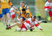 23 April 2000; Niall McOscar of Derry in action against Francie Grehan and Frankie Dolan of Roscommon during the Church & General National Football League Division 1 Semi-Final match between Derry and Roscommon at St Tiernach's Park in Clones, Monaghan. Photo by Damien Eagers/Sportsfile
