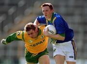 23 April 2000; Noel Kennelly of Kerry in action against Cormac Murphy of Meath during the Church & General National Football League Division 1 Semi-Final match between Kerry and Meath at Semple Stadium in Thurles, Tipperary. Photo by Brendan Moran/Sportsfile