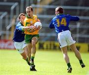23 April 2000; Paddy Reynolds of Meath in action against Denis O'Dwyer and Dara O'Cinneide of Kerry during the Church & General National Football League Division 1 Semi-Final match between Kerry and Meath at Semple Stadium in Thurles, Tipperary. Photo by Brendan Moran/Sportsfile