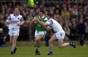 13 April 2000; Pat Ahearne of Limerick is tackled by  Michael Ahearne of Waterford during the Munster Under-21 Football Championship Final match between Waterford and Limerick at Fraher Field in Dungarvan, Waterford. Photo by Matt Browne/Sportsfile