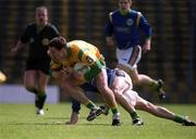 23 April 2000; Ronan Fitzsimons of Meath in action against Tom O'Sullivan of Kerry during the Church & General National Football League Division 1 Semi-Final match between Kerry and Meath at Semple Stadium in Thurles, Tipperary. Photo by Brendan Moran/Sportsfile