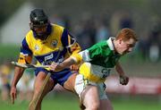 2 April 2000; Simon Whelahan of Offaly in action against David Forde of Clare during the Church & General National Hurling League Division 1A Round 5 match between Offaly and Clare at St Brendan's Park in Birr, Offaly. Photo by Aoife Rice/Sportsfile
