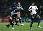 18 November 2007; Girvan Dempsey, Leinster, is tackled by Yannick Jauzion and Meleli Kunavore, right, Toulouse. Heineken Cup, Pool 6, Round 2, Toulouse v Leinster, Toulouse, France. Picture credit; Matt Browne / SPORTSFILE *** Local Caption ***