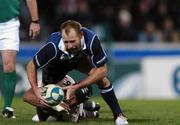 18 November 2007; Chris Whitaker, Leinster, is tackled by theirry Dusautoir, Toulouse, which led to him being taken off with a injured ankle. Heineken Cup, Pool 6, Round 2, Toulouse v Leinster, Toulouse, France. Picture credit; Matt Browne / SPORTSFILE *** Local Caption ***