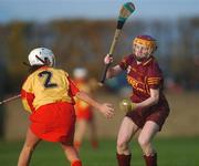 18 November 2007; Patricia McCabe, Keady, Armagh, in action against Elaine Cuddy, Harps, Laois. All-Ireland Junior Camogie Club Championship Final, Keady, Armagh v Harps, Laois, Stabannon Parnells, Stabannon, Co. Louth. Picture credit: Caroline Quinn / SPORTSFILE  *** Local Caption ***