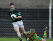 25 November 2007; Paul Kerrigan, Nemo Rangers, in action against Liam Martin, Ballylanders. AIB Munster Senior Club Football Championship Semi-Final, Ballylanders, Limerick, v Nemo Rangers, Cork. John Fitzgerald Park, Kilmallock, Co. Limerick. Picture credit; Kieran Clancy / SPORTSFILE