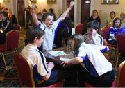 14 February 2015; Micheal O hEithrirn, Spa Cill Airne, Co. Kerry, reacts along side his team-mates Niamh Ni Chlumhain, Tomas Pleamonn and Seamus O Loiinsigh after winning the Table Quiz competition at the All-Ireland Scór na nÓg Championship Finals 2015. Citywest Hotel, Saggart, Co. Dublin. Picture credit: Pat Murphy / SPORTSFILE