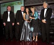 17 November 2007; Rebeca Hallahan, Waterford, is presented with her Allstar award by Geraldine Giles, President, Cumann Peil na mBan, in the company of An Taoiseach Bertie Ahern, T.D, Pol O Callachoir, left, Ceannsai, TG4 and Tony Towell, O'Neills, at the 2007 O'Neills/TG4 Ladies Football All-Star Awards. Citywest Hotel, Conference, Leisure & Golf Resort, Saggart, Co. Dublin. Picture credit: Brendan Moran / SPORTSFILE  *** Local Caption ***