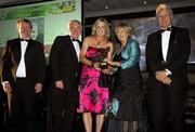 17 November 2007; Angela Walsh, Cork, is presented with her Allstar award by Geraldine Giles, President, Cumann Peil na mBan, in the company of An Taoiseach Bertie Ahern, T.D, Pol O Callachoir, left, Ceannsai, TG4 and Tony Towell, O'Neills, at the 2007 O'Neills/TG4 Ladies Football All-Star Awards. Citywest Hotel, Conference, Leisure & Golf Resort, Saggart, Co. Dublin. Picture credit: Brendan Moran / SPORTSFILE  *** Local Caption ***