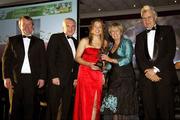 17 November 2007; Rena Buckley, Cork, is presented with her Allstar award by Geraldine Giles, President, Cumann Peil na mBan, in the company of An Taoiseach Bertie Ahern, T.D, Pol O Callachoir, left, Ceannsai, TG4 and Tony Towell, O'Neills, at the 2007 O'Neills/TG4 Ladies Football All-Star Awards. Citywest Hotel, Conference, Leisure & Golf Resort, Saggart, Co. Dublin. Picture credit: Brendan Moran / SPORTSFILE  *** Local Caption ***