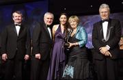 17 November 2007; Sarah McLoughlin, Leitrim, is presented with her Allstar award by Geraldine Giles, President, Cumann Peil na mBan, in the company of An Taoiseach Bertie Ahern, T.D, Pol O Callachoir, left, Ceannsai, TG4 and Tony Towell, O'Neills, at the 2007 O'Neills/TG4 Ladies Football All-Star Awards. Citywest Hotel, Conference, Leisure & Golf Resort, Saggart, Co. Dublin. Picture credit: Brendan Moran / SPORTSFILE  *** Local Caption ***