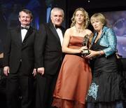 17 November 2007; Cora Staunton, Mayo, is presented with her Allstar award by Geraldine Giles, President, Cumann Peil na mBan, in the company of An Taoiseach Bertie Ahern, T.D, Pol O Callachoir, left, Ceannsai, TG4, at the 2007 O'Neills/TG4 Ladies Football All-Star Awards. Citywest Hotel, Conference, Leisure & Golf Resort, Saggart, Co. Dublin. Picture credit: Brendan Moran / SPORTSFILE  *** Local Caption ***