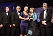 17 November 2007; Tracey Lawlor, Laois, is presented with her Allstar award by Geraldine Giles, President, Cumann Peil na mBan, in the company of An Taoiseach Bertie Ahern, T.D, Pol O Callachoir, left, Ceannsai, TG4 and Tony Towell, O'Neills, at the 2007 O'Neills/TG4 Ladies Football All-Star Awards. Citywest Hotel, Conference, Leisure & Golf Resort, Saggart, Co. Dublin. Picture credit: Brendan Moran / SPORTSFILE  *** Local Caption ***