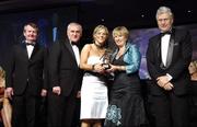 17 November 2007; Valerie Mulcahy, Cork, is presented with her Allstar award by Geraldine Giles, President, Cumann Peil na mBan, in the company of An Taoiseach Bertie Ahern, T.D, Pol O Callachoir, left, Ceannsai, TG4 and Tony Towell, O'Neills, at the 2007 O'Neills/TG4 Ladies Football All-Star Awards. Citywest Hotel, Conference, Leisure & Golf Resort, Saggart, Co Dublin. Picture credit: Brendan Moran / SPORTSFILE  *** Local Caption ***