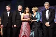 17 November 2007; Gemma Begley, Tyrone, is presented with her Allstar award by Geraldine Giles, President, Cumann Peil na mBan, in the company of An Taoiseach Bertie Ahern, T.D, Pol O Callachoir, left, Ceannsai, TG4 and Tony Towell, O'Neills, at the 2007 O'Neills/TG4 Ladies Football All-Star Awards. Citywest Hotel, Conference, Leisure & Golf Resort, Saggart, Co. Dublin. Picture credit: Brendan Moran / SPORTSFILE  *** Local Caption ***