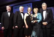 17 November 2007; Mary Rose Kelly, Wexford, is presented with her Allstar award by Geraldine Giles, President, Cumann Peil na mBan, in the company of An Taoiseach Bertie Ahern, T.D, Pol O Callachoir, left, Ceannsai, TG4 and Tony Towell, O'Neills, at the 2007 O'Neills/TG4 Ladies Football All-Star Awards. Citywest Hotel, Conference, Leisure & Golf Resort, Saggart, Co. Dublin. Picture credit: Brendan Moran / SPORTSFILE  *** Local Caption ***