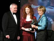 17 November 2007; Louise Ni Mhuirearchtaigh, Kerry, is presented with her Munster Player of the Year by An Taoiseach Bertie Ahern T.D. in the company of Geraldine Giles, President, Cumann Peil na mBan, at the 2007 O'Neills/TG4 Ladies Gaelic Football All-Star Awards. Citywest Hotel, Conference, Leisure & Golf Resort, Saggart, Co. Dublin. Picture credit: Brendan Moran / SPORTSFILE  *** Local Caption ***