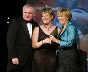 17 November 2007; Mary Quinn, Leitrim, is presented with the Hall of Fame award by An Taoiseach Bertie Ahern T.D. in the company of Geraldine Giles, President, Cumann Peil na mBan, at the 2007 O'Neills/TG4 Ladies Gaelic Football All-Star Awards. Citywest Hotel, Conference, Leisure & Golf Resort, Saggart, Co. Dublin. Picture credit: Brendan Moran / SPORTSFILE  *** Local Caption ***