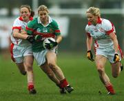 25 November 2007; Cora Staunton, Carnacon, Mayo, in action against Mairead Kennedy, left, and Angela Walsh, Inch Rovers, Cork. VHI Healthcare All-Ireland Ladies Senior Club Football Championship Final, Carnacon, Mayo v Inch Rovers, Cork, St Rynaghs GAA, Club, Banagher, Co. Offaly. Picture credit: Brian Lawless / SPORTSFILE