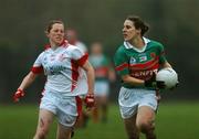 25 November 2007; Martha Carter, Carnacon, Mayo, in action against Claire Keohane, Inch Rovers, Cork. VHI Healthcare All-Ireland Ladies Senior Club Football Championship Final, Carnacon, Mayo v Inch Rovers, Cork, St Rynaghs GAA, Club, Banagher, Co. Offaly. Picture credit: Brian Lawless / SPORTSFILE