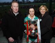 25 November 2007; Captain Caroline McGing, Carnacon, Mayo, is presented with the cup by Geraldine Giles, President, Cumann Peil na mBan, and Declan Moran, Director, Marketing & Business Development. VHI Healthcare All-Ireland Ladies Senior Club Football Championship Final, Carnacon, Mayo v Inch Rovers, Cork, St Rynaghs GAA, Club, Banagher, Co. Offaly. Picture credit: Brian Lawless / SPORTSFILE