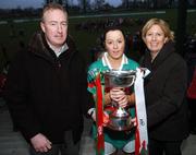 25 November 2007; Captain Caroline McGing, Carnacon, Mayo, is presented with the cup by Geraldine Giles, President, Cumann Peil na mBan, and Declan Moran, Director, Marketing & Business Development. VHI Healthcare All-Ireland Ladies Senior Club Football Championship Final, Carnacon, Mayo v Inch Rovers, Cork, St Rynaghs GAA, Club, Banagher, Co. Offaly. Picture credit: Brian Lawless / SPORTSFILE