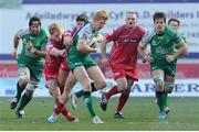 15 February 2015; Darragh Leader, Connacht, is tackled by Aled Davies and Regan King, Scarlets. Guinness PRO12, Round 14, Scarlets v Connacht, Parc Y Scarlets, Llanelli, Wales. Picture credit: Ian Cook / SPORTSFILE