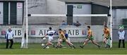 14 February 2015; Corofin's Cathal Silke, supported by goalkeeper Tom Healy and team mates Daithí Burke and Kieran Fitzgerald, moves to block a shot by Ruairí Treanor, St Vincent's, late in the game. AIB GAA Football All-Ireland Senior Club Championship, Semi-Final, Corofin v St Vincent's. O'Connor Park, Tullamore, Co. Offaly. Picture credit: Ray McManus / SPORTSFILE