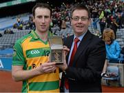 15 February 2015; Sean Morrissey, Bennettsbridge, is presented with the Man of the Match Award by AIB's Regional Director Midlands, Edward Buckley. AIB GAA Hurling All-Ireland Junior Club Championship Final, Bennettsbridge v Fullen Gaels, Croke Park, Dublin. Picture credit: Oliver McVeigh / SPORTSFILE