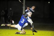 2 January 2008; Dan Shanahan, Waterford, puts over his first point of the year despite the tackle of Kevin Lanigan, Waterford Institute of Technology. Waterford Crystal tournament, Waterford v Waterford Institute of Technology, St Molleran's club, Carrick-On-Suir, Co. Tipperary. Picture credit: Matt Browne / SPORTSFILE