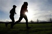 5 January 2008; Competitors warm up before the start of the  South Dublin County Council Cross Country Race. Tymon Park, Tallaght, Co. Dublin. Picture credit: Tomas Greally / SPORTSFILE