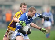 6 January 2008; Billy Sheehan, Laois, in action against Redmond Barry, Wexford. O'Byrne Cup, First Round, Wexford v Laois, Belfield, Enniscorthy, Co. Wexford. Picture credit; Matt Browne / SPORTSFILE