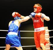 10 January 2008; Ross Hickey, Grangecon Boxing Club, blue, in action against Eric Donovan, St Michael's Athy Boxing Club, red. National Senior Boxing Championships Semi-Finals, 60Kg Lightweight Championship, Eric Donovan.v.Ross Hickey, National Boxing Stadium, South Circular Road, Dublin. Picture credit; Stephen McCarthy / SPORTSFILE