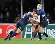 12 January 2008; Valentin Courrent, Toulouse, is tackled by Stan Wright, left, and Jamie Heaslip, Leinster. Heineken Cup, Pool 6, Round 5, Leinster v Toulouse, RDS, Dublin. Picture credit; Brendan Moran / SPORTSFILE