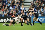 12 January 2008; Vincent Clerc, Toulouse, is tackled vy  Leinster players, from left, Girvan Dempsey, Felipe Contepomi and Gordon D'Arcy, Toulouse. Heineken Cup, Pool 6, Round 5, Leinster v Toulouse, RDS, Dublin. Picture credit; Stephen McCarthy / SPORTSFILE *** Local Caption ***